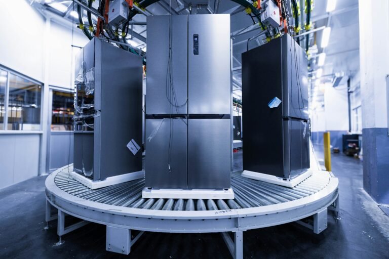 Picture of industrial refrigerators on a conveyor belt